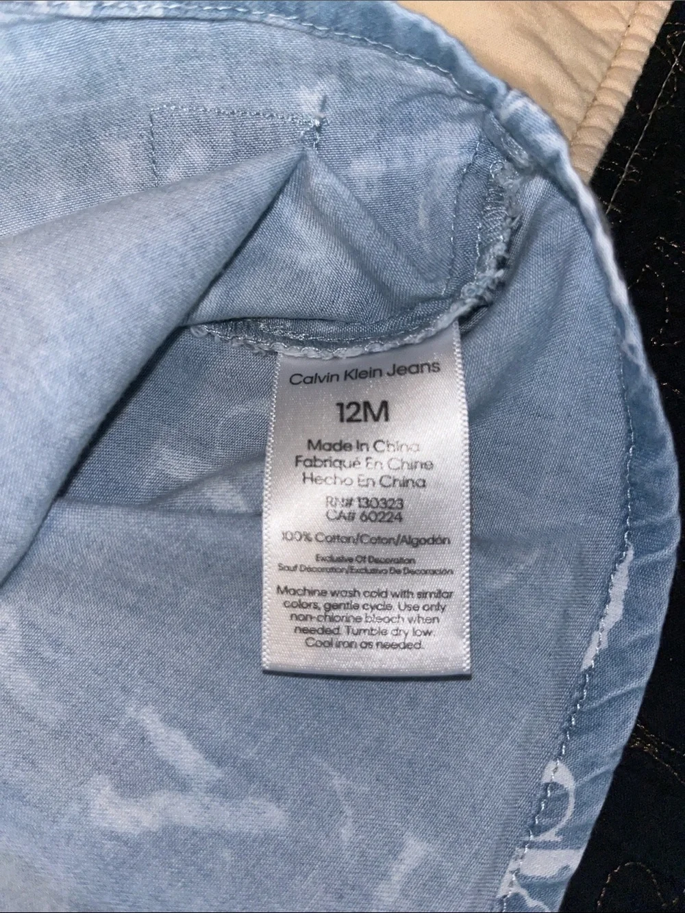 Calvin Klein Jeans Pale Blue Abstract Infant top with Wood-Tone Buttons